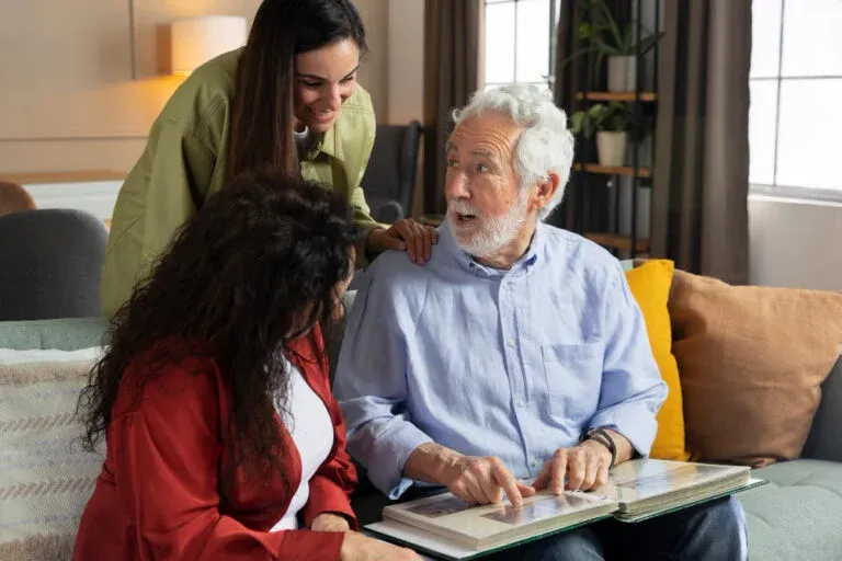 Compassionate caregiver assisting elderly patient at home with daily care and support